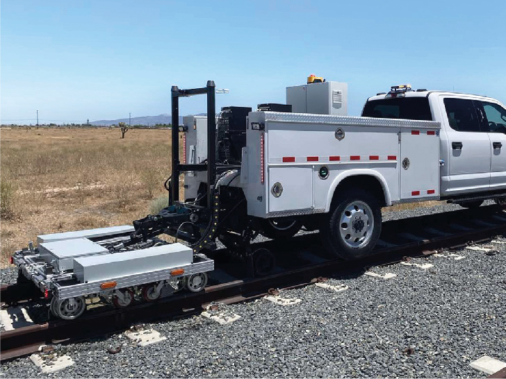 High speed ultrasonic testing of rails in a railway track