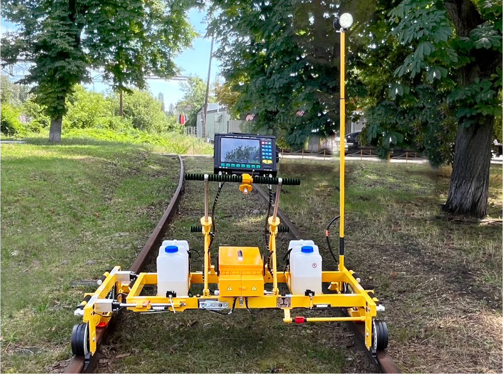 Ultrasonic mechanized flaw detector for inspection of one rail line UDS2-77